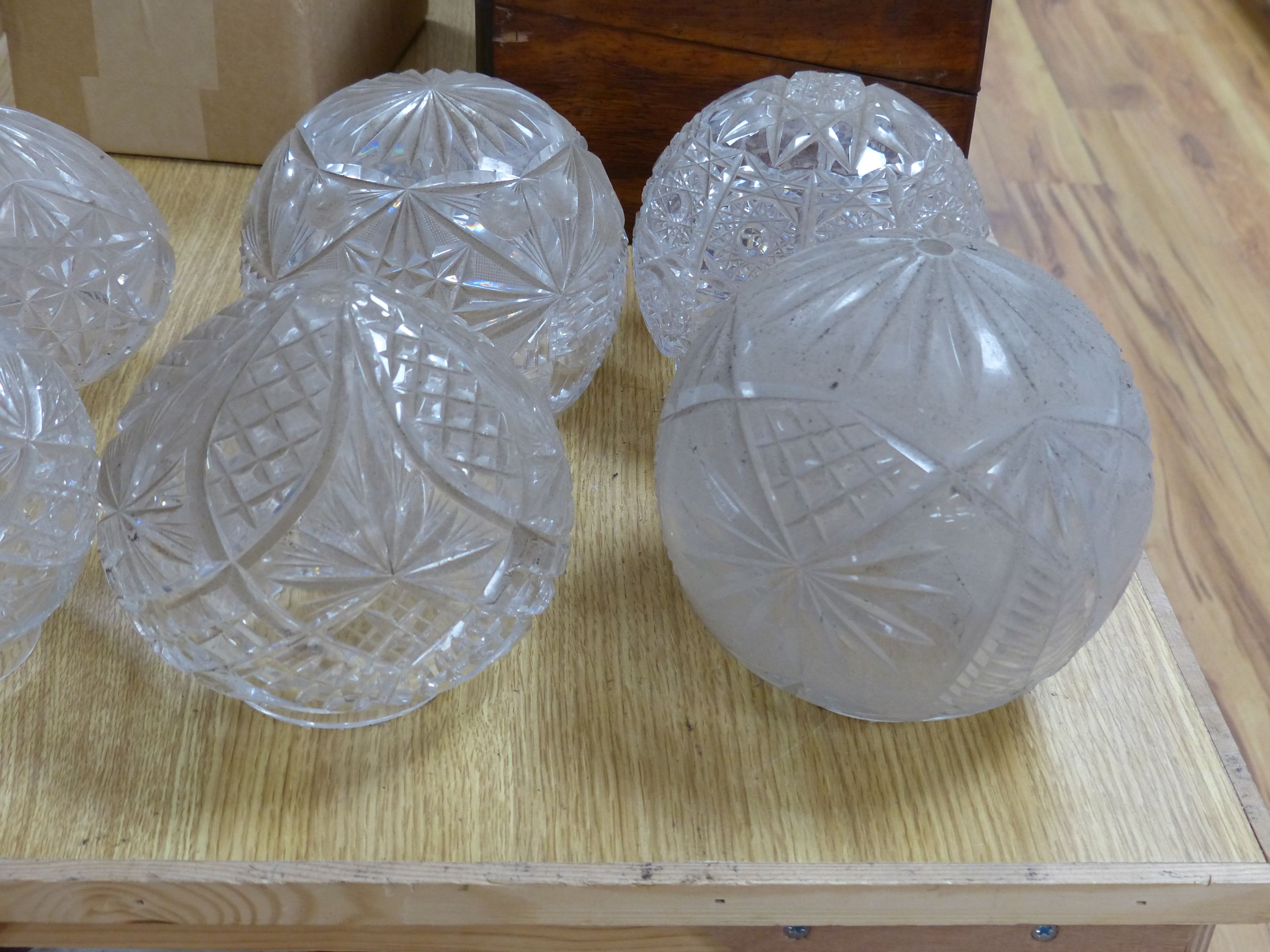 A collection of circular cut glass table lamp shades (6)